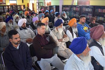 Farmers at workshop listening to speakers with keen interest
