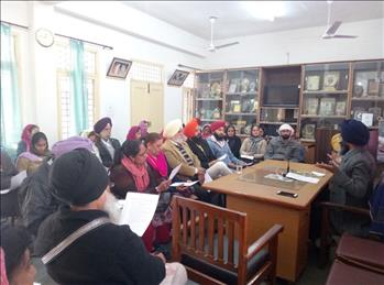 Attendees checking their takeaway points from the meeting.