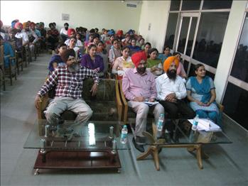 Attendees showing keen interest in the talk being delivered.