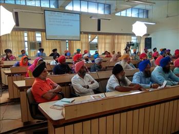 Participants were all ears during the review meeting.