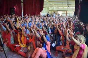 Students raising hands in willingness to become truthful human being
