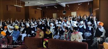 Students raising hands in willingness to become Truthful Human beings