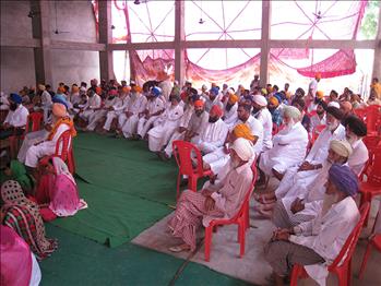 Farmers showing keen interest in the talk being delivered.