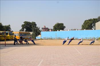 Students participating in a game of tug of war