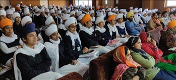 Students at workshop listening to speaker with keen interest