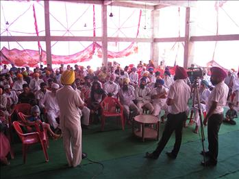Farmers engrossed in the training camp.