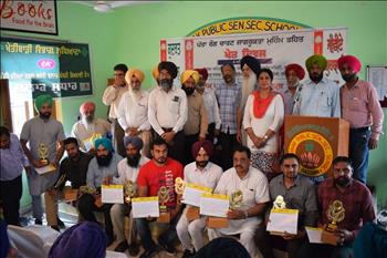 The progressive farmers being facilitated with appreciation certificates