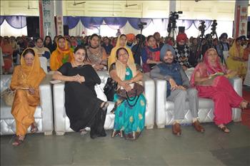 Audience at workshop listening to speakers with keen interest