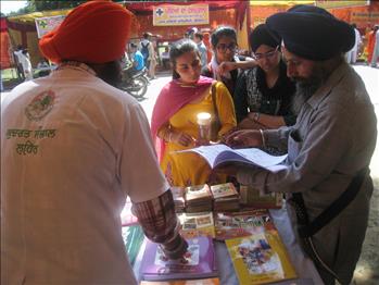 Visitors showing keen interest in Atam Pargas publications.