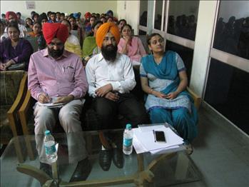 Dignitaries listening attentively to the honorable speaker.