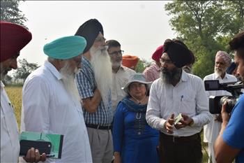 Dr. Varinderpal Singh demonstrating the use of PAU-LCC 