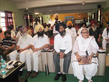 The dignitaries listening carefully to the views of the participant teachers.