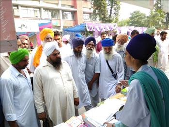 Volunteers addressing the queries of visitors