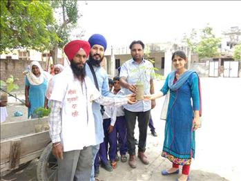 Atam Pargas team with the school authorities.