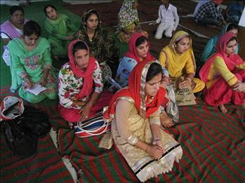 The delegates taking notes of the key points discussed during the workshop.