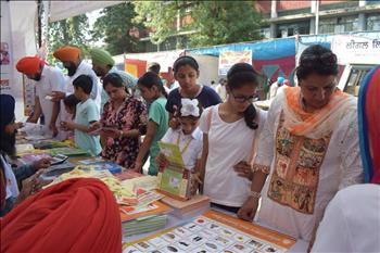 Volunteers addressing the queries of visitors gathered in good number