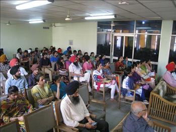 Participants attentive to the presentations.