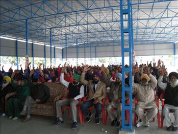 Participants promising with raised hands to carry forward the Atam Pargas Mission of moral reconstruction of society