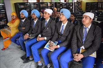 Student listening with keen interest